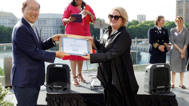 Hill Dickinson Master Mariner celebrates receiving Merchant Navy Medal at IMO